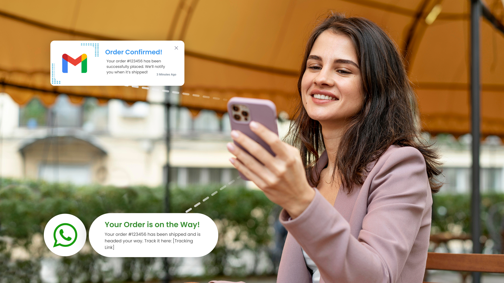A customer smiling at her phone, with example order-confirmed and on-the-way messages by email and WhatsApp